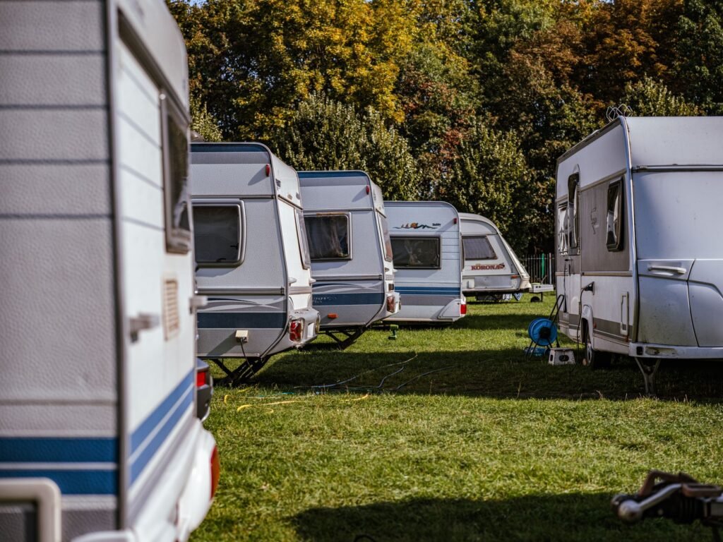 A travel trailer with electronic sway control active on a highway. practical detail